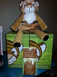 Tucker sitting on a box